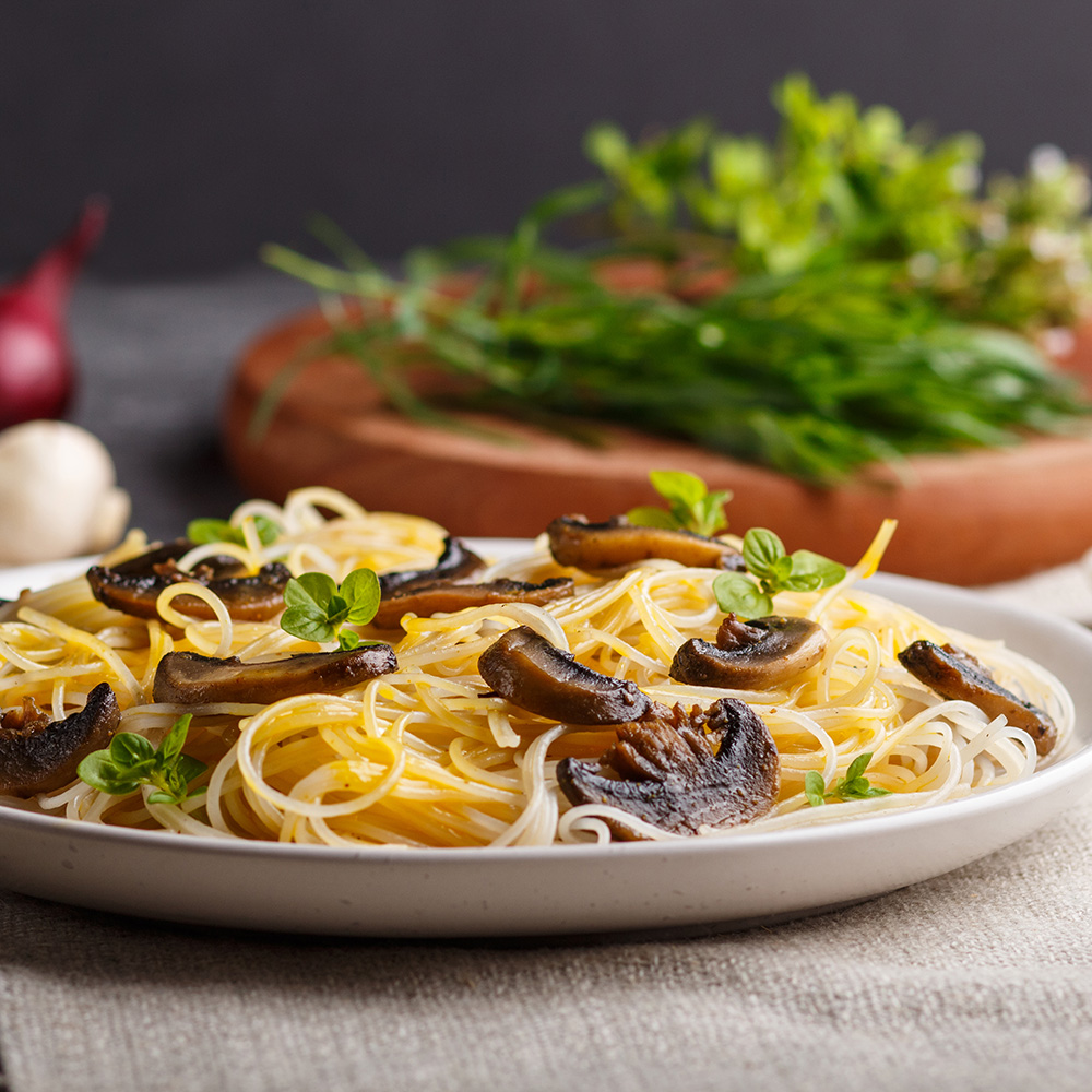 Rice noodles with champignons mushrooms egg sauce square